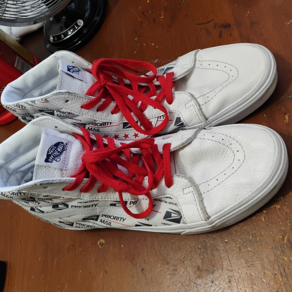 Vans White High-Tops with Red Accents